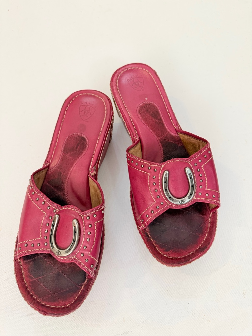 Ariat cranberry red slip on sandal with silver horseshoe detail